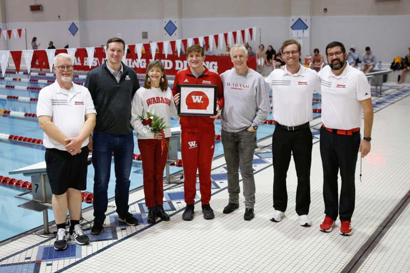 a group of people posing for a photo