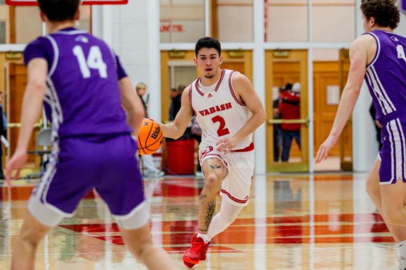 a basketball player dribbling a basketball