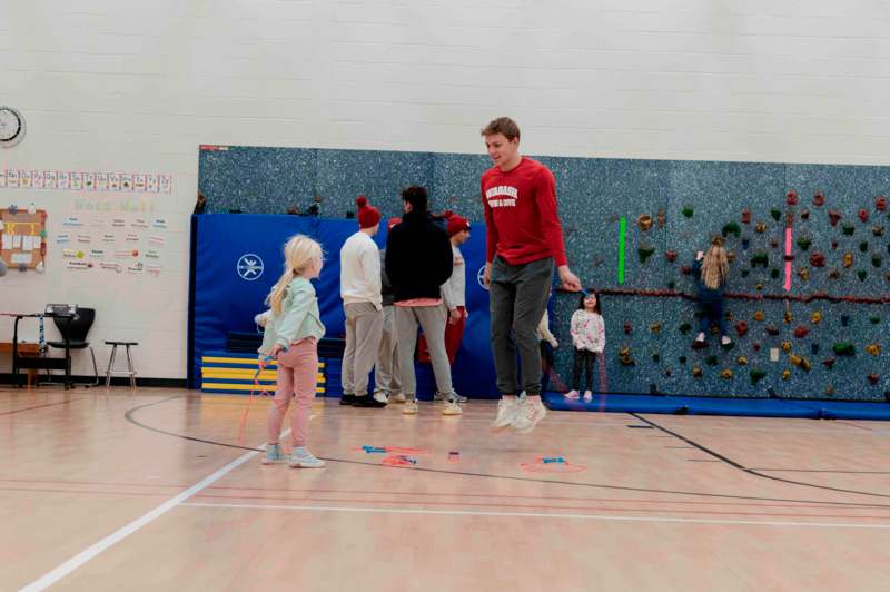 a group of people in a gym