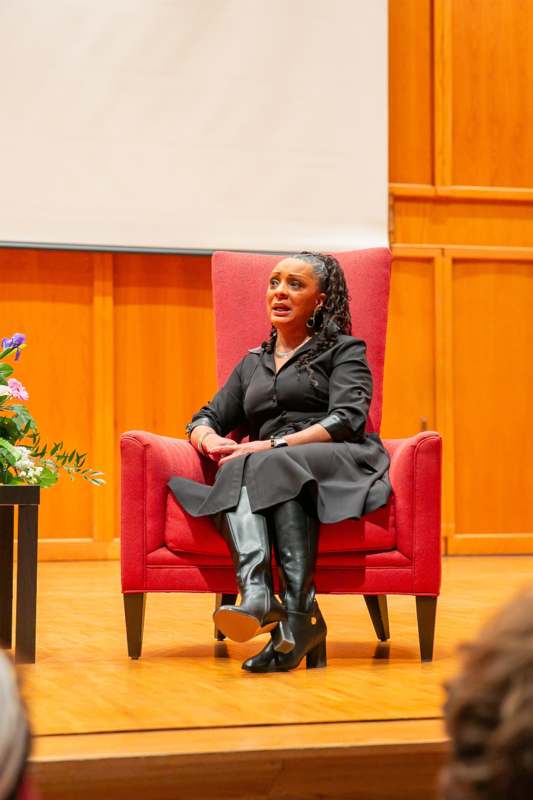 a woman sitting in a chair