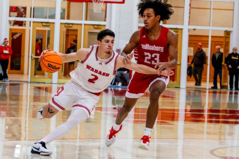 a basketball player dribbling a basketball