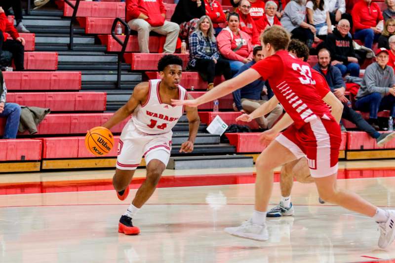 a basketball player dribbling a basketball