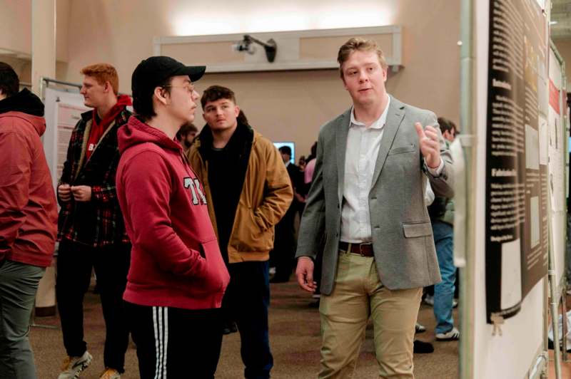 a group of people standing in a room