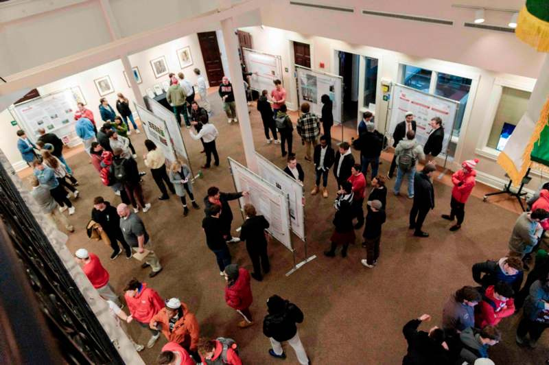 a group of people standing in a room