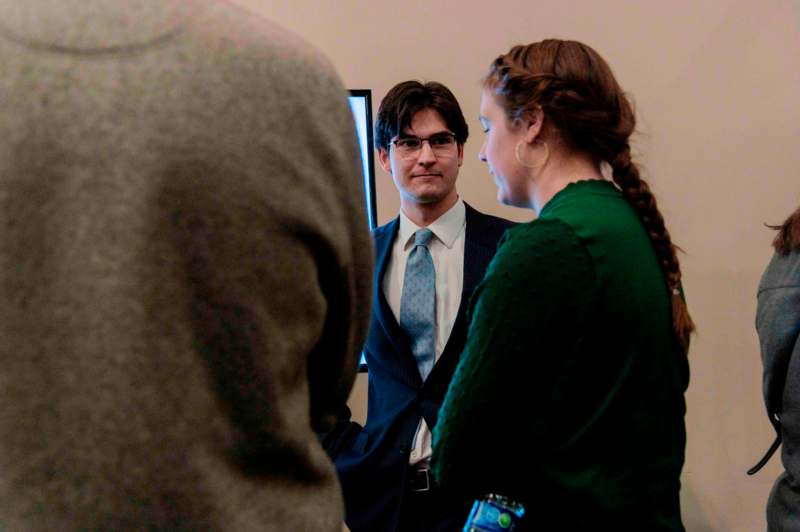 a man and woman in a suit and tie