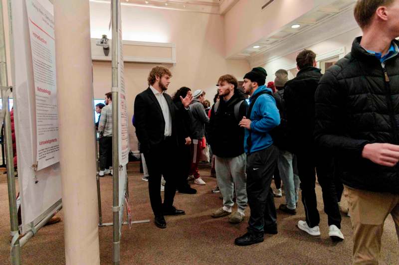 a group of people standing in a room