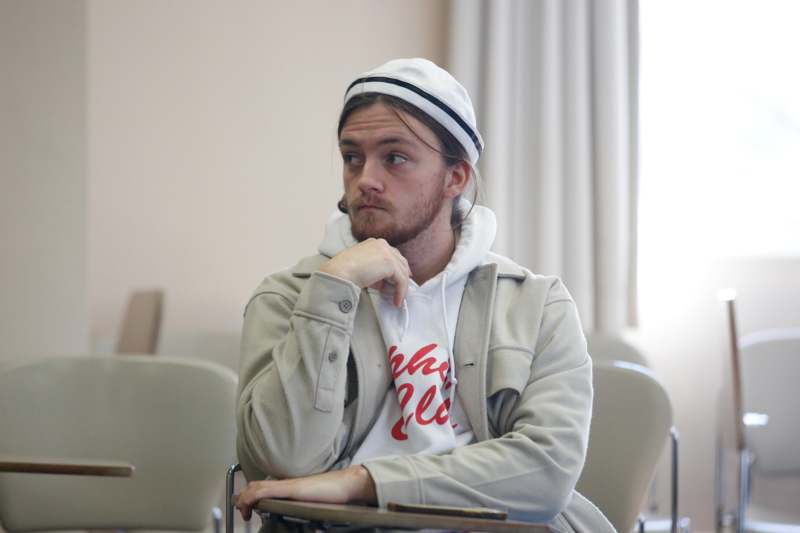 a man sitting at a desk