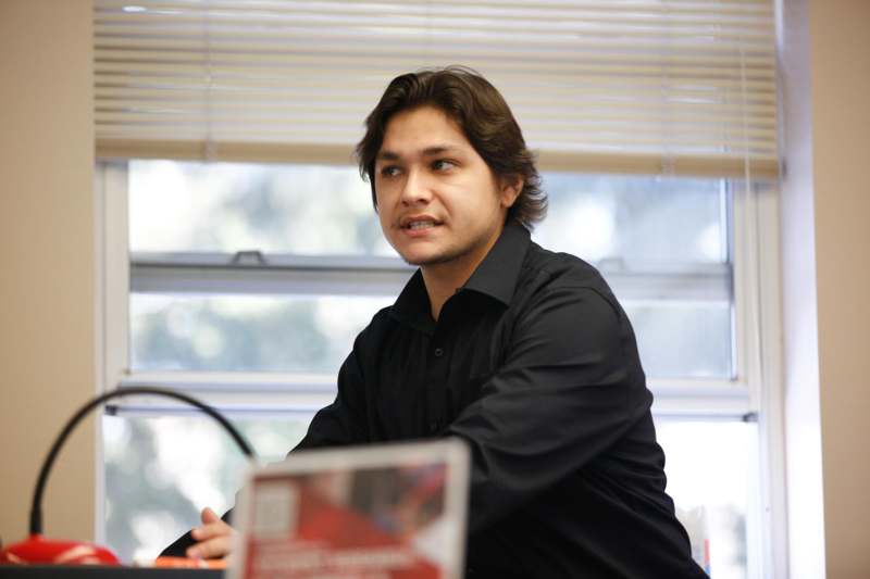 a man sitting at a desk