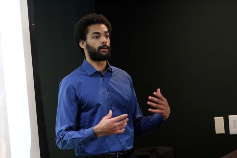 a man in a blue shirt