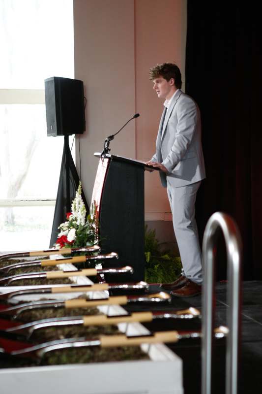 a man standing at a podium