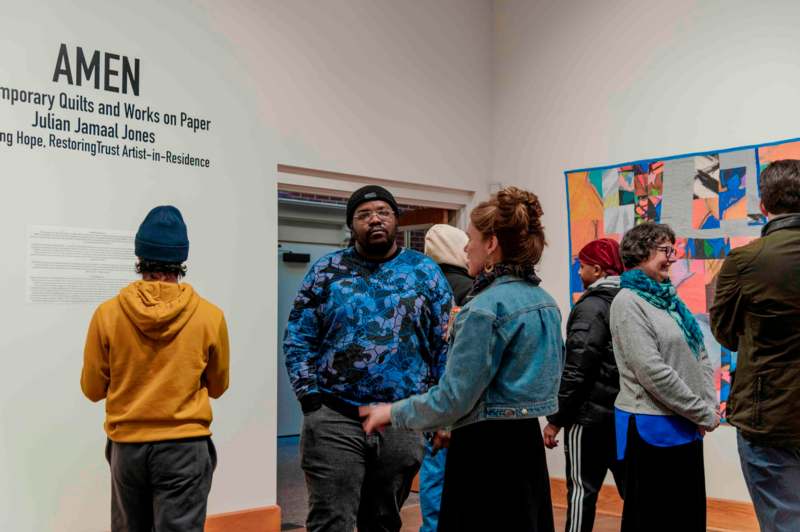 a group of people standing in a room