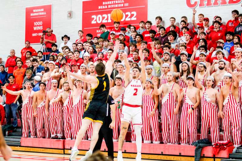 a group of people in a basketball game