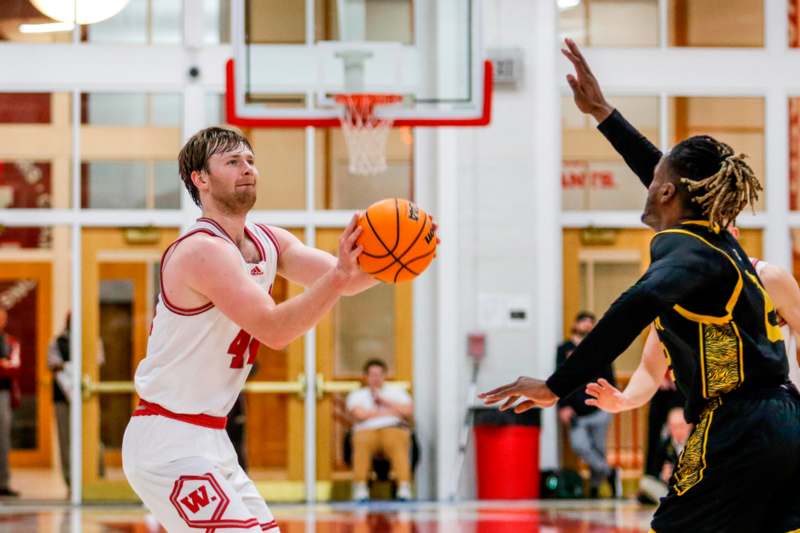 a basketball player in a gym