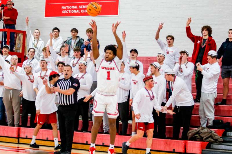 a group of people in a basketball game