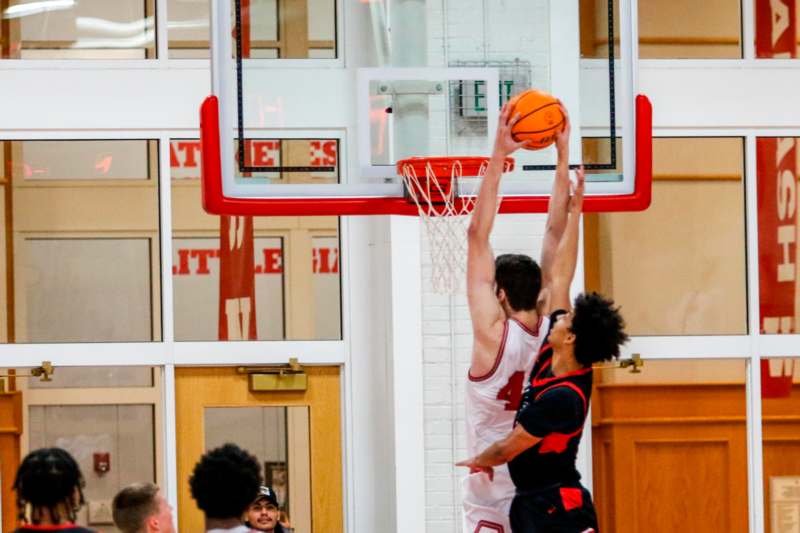 a basketball player going to shoot a ball