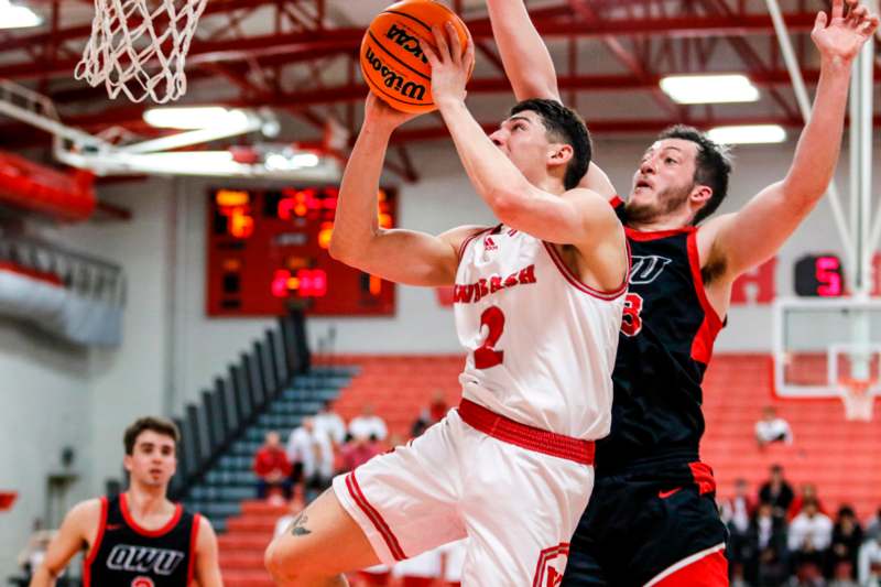 a basketball player in a gym