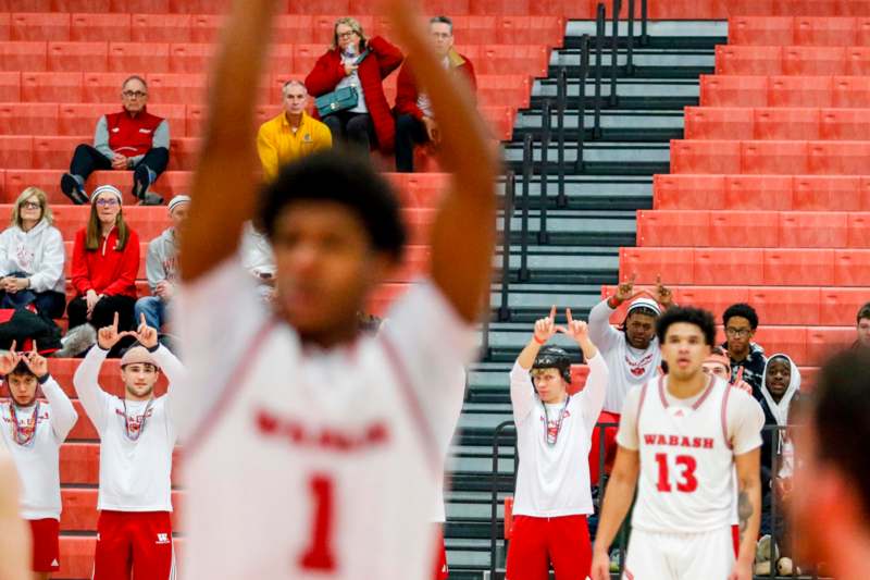 a group of people in a basketball game