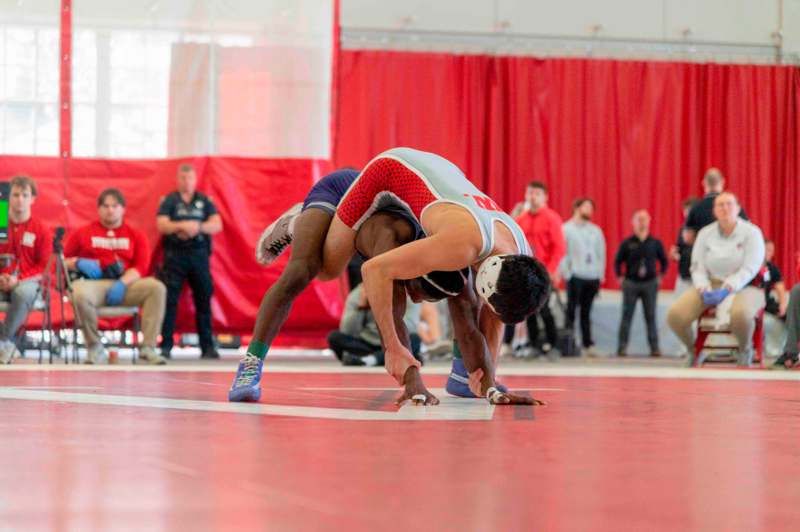 a group of people wrestling