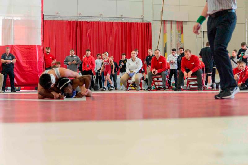 a group of people in a wrestling match