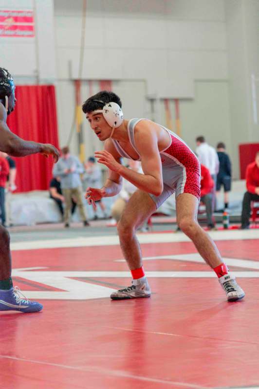 a man in a wrestling uniform