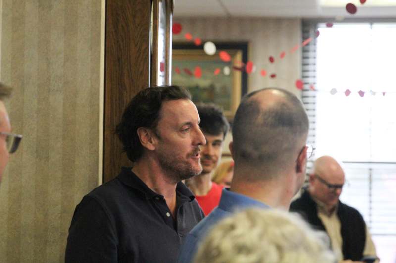 a man looking at another man