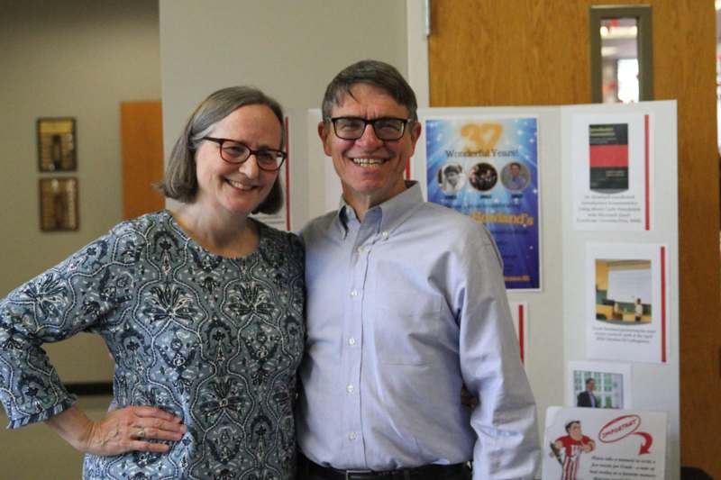 a man and woman standing together
