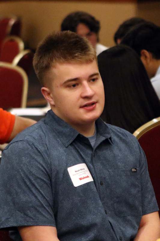 a man in a blue shirt