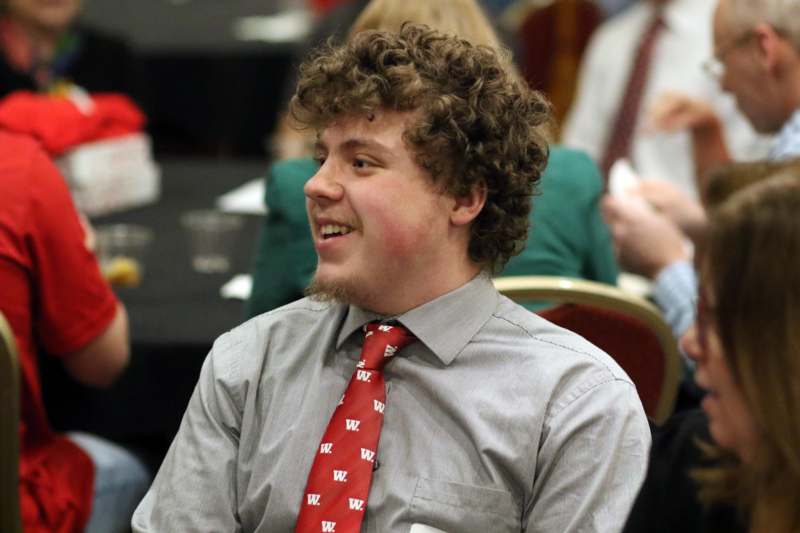 a man in a red tie