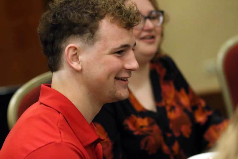 a man in a red shirt
