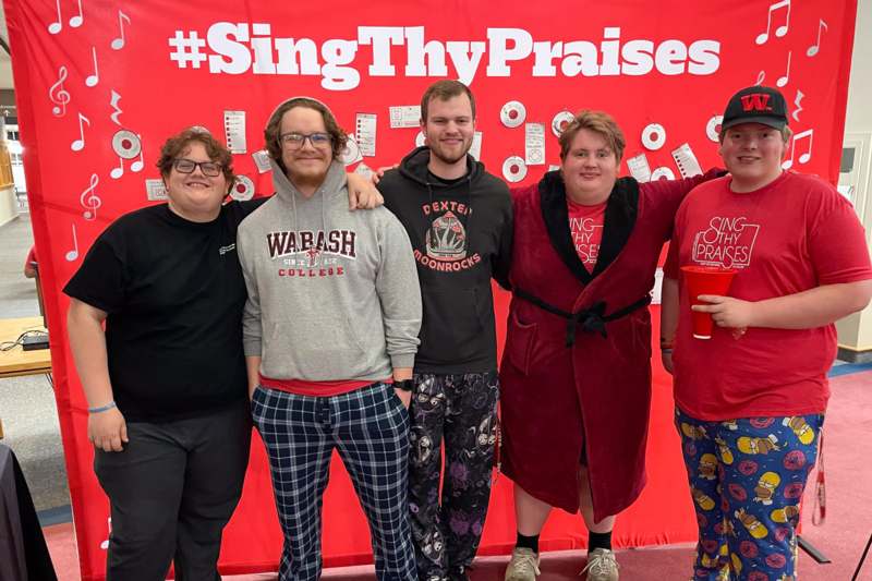 a group of people posing for a photo