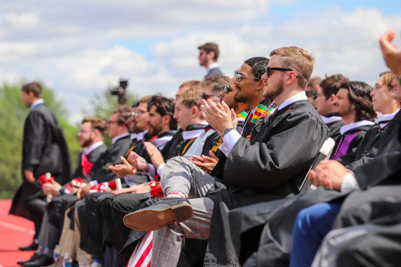a group of people in graduation gowns