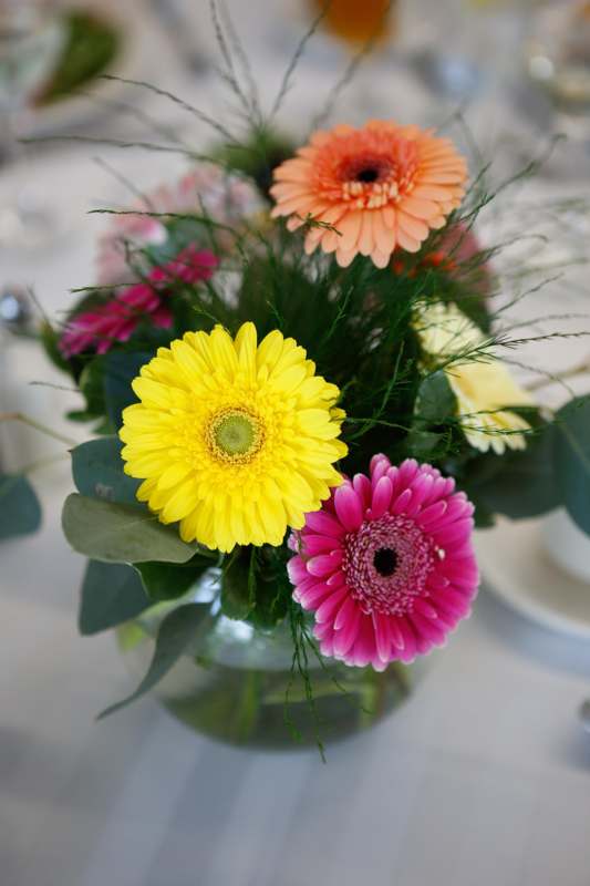 a bouquet of flowers in a glass vase