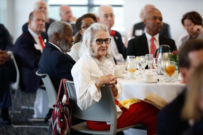 a group of people sitting at a table