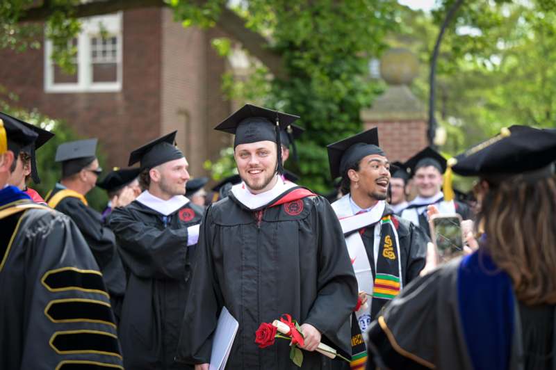 a group of people in graduation gowns