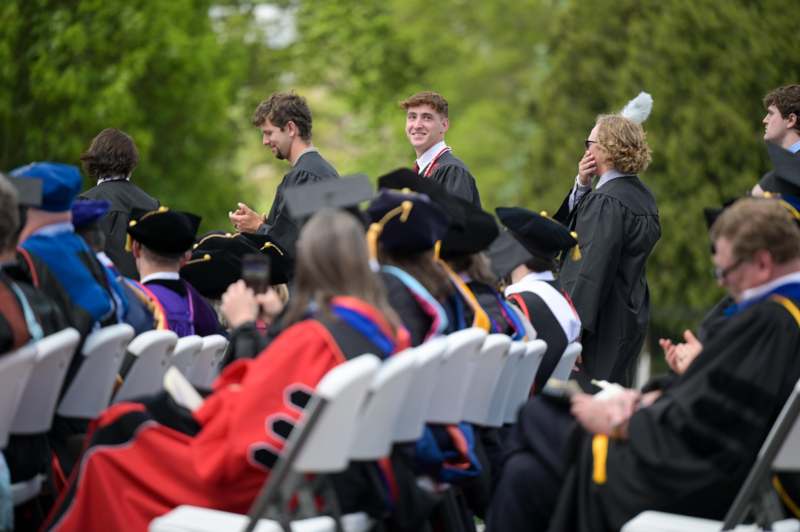 a group of people in graduation gowns