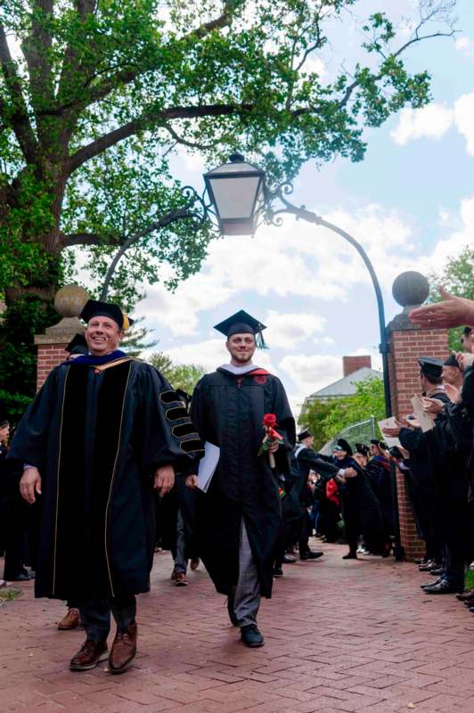 a group of people in graduation gowns