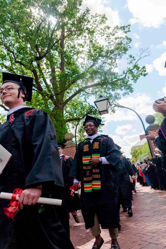 a group of people in graduation gowns