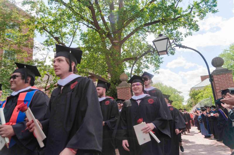 a group of people in graduation gowns