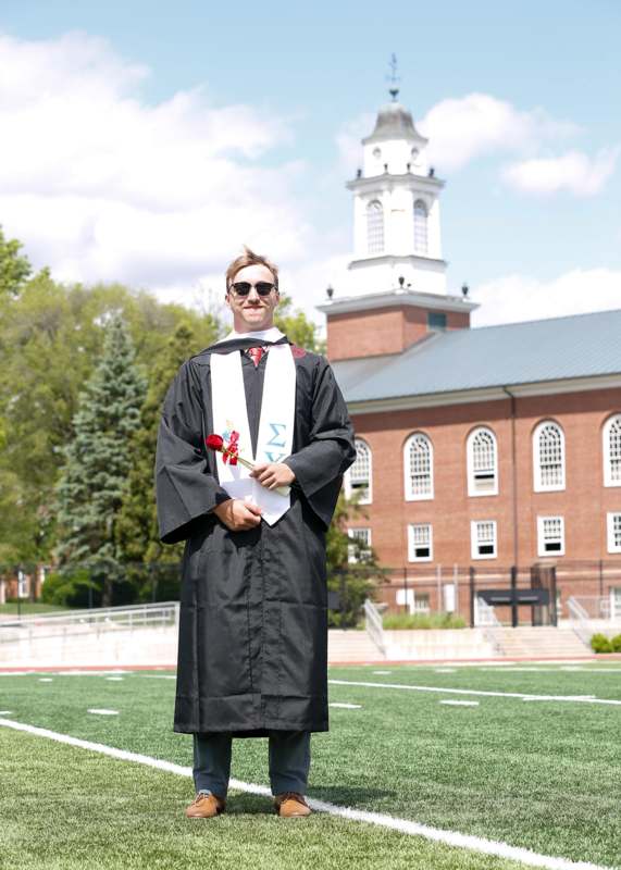 a man in a graduation gown
