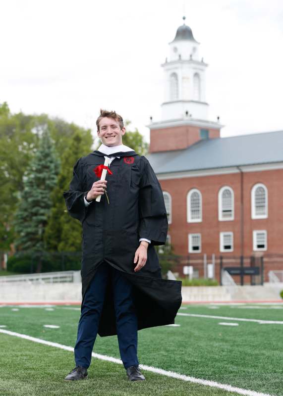 a man in a graduation gown