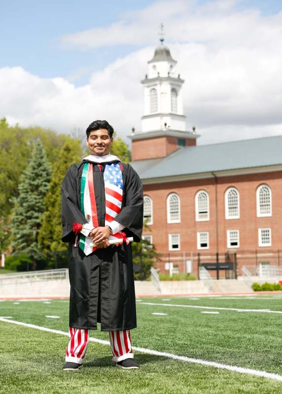 a man in a graduation gown