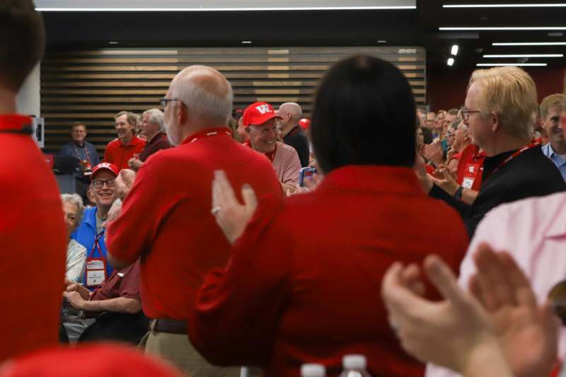 a group of people clapping