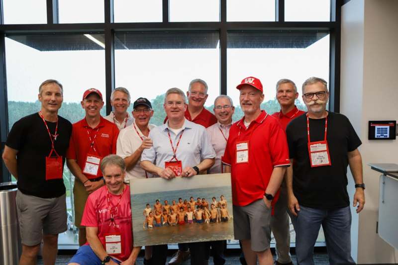 a group of people posing for a photo