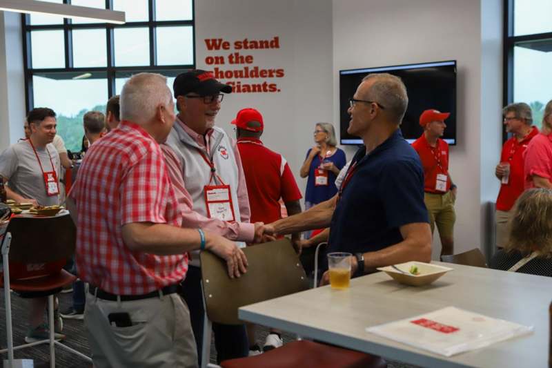 a group of men shaking hands