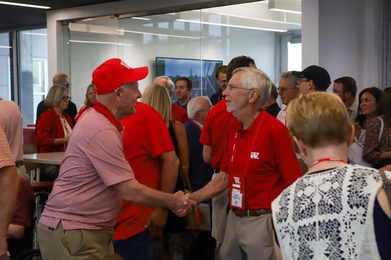 a group of people shaking hands