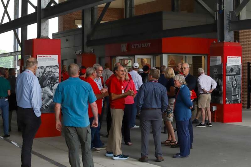 a group of people standing in a line
