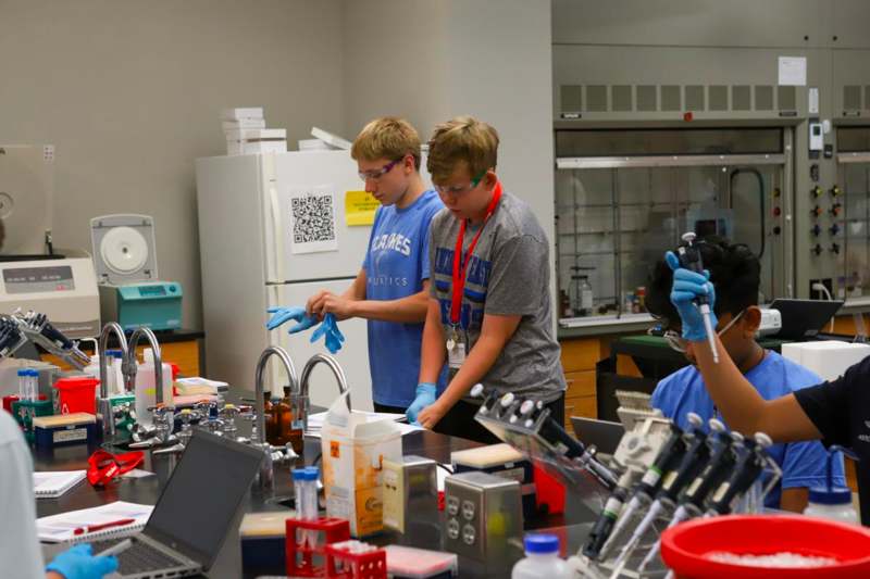 a group of people in a lab