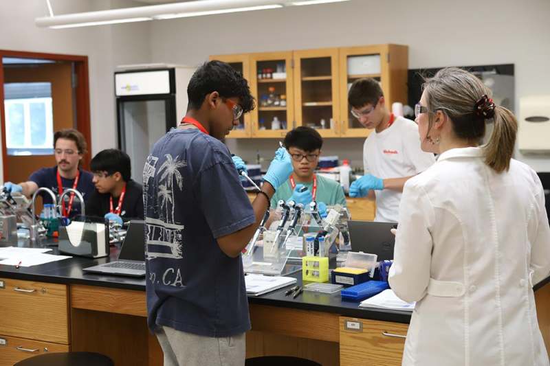 a group of people in a lab