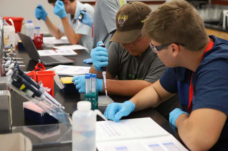 a group of people working in a lab