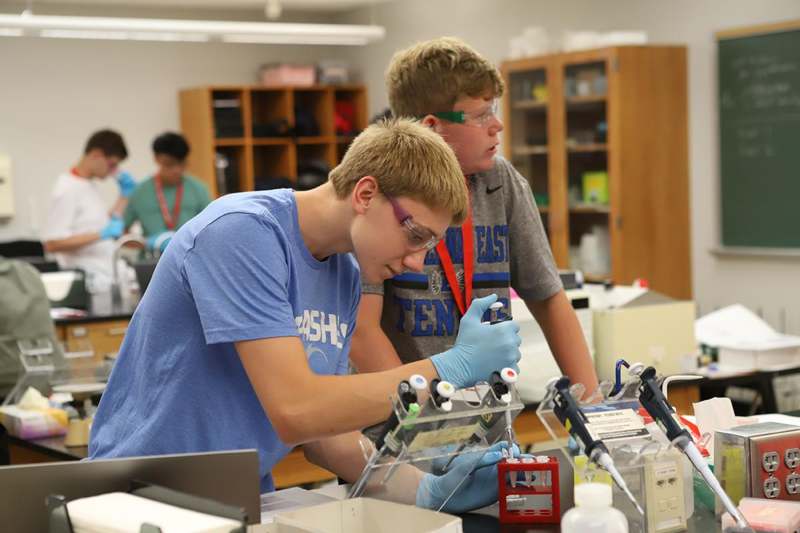 a group of people in a lab